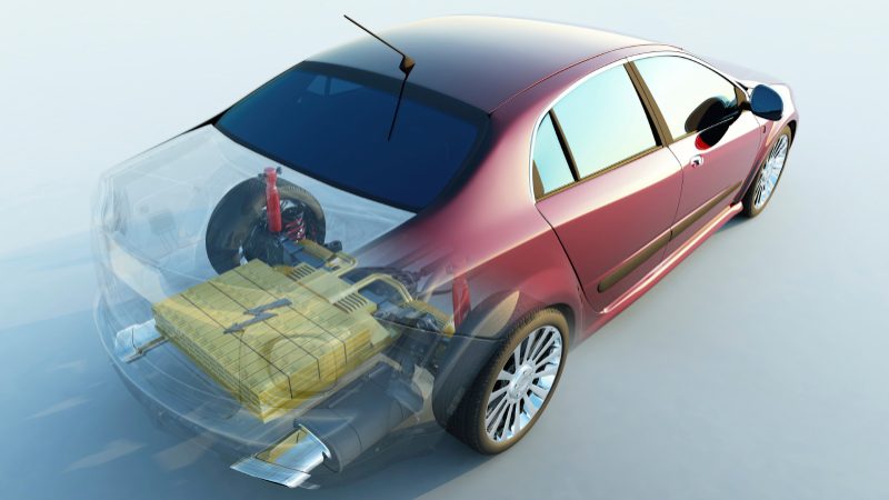 Computer-rendered graphic of a car with an invisible section allowing the viewer to see the electric battery components.